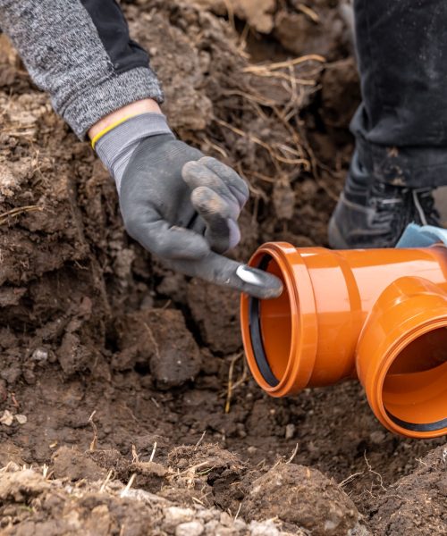 plastic pvc waste sewer pipe in the ground. construction site